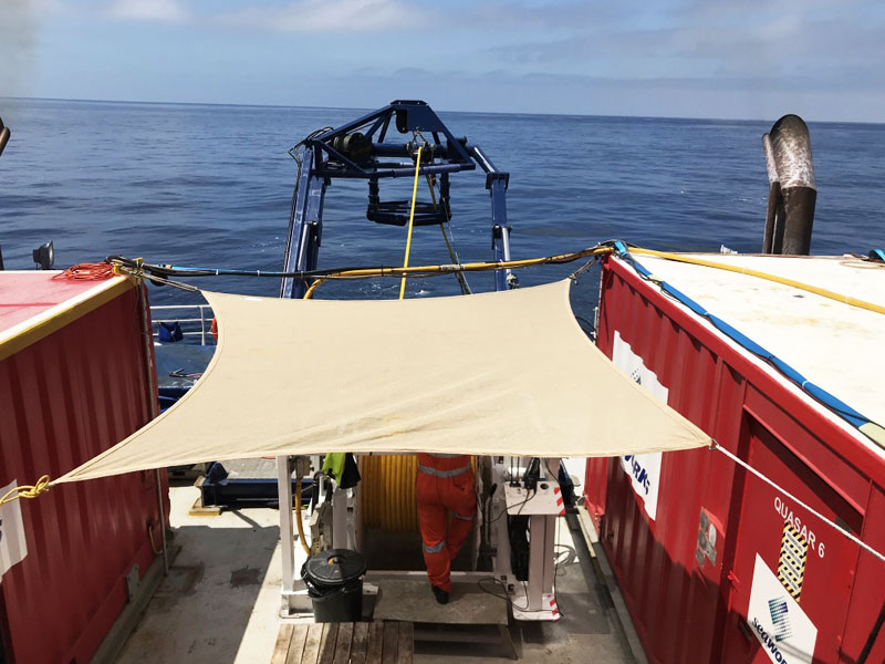 Offshore support vessel working alongside a specialised marine structure